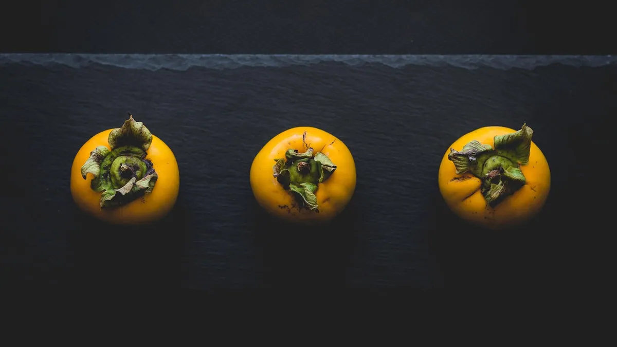 Can Cats Eat Persimmons? Skin, Seeds, and Safety