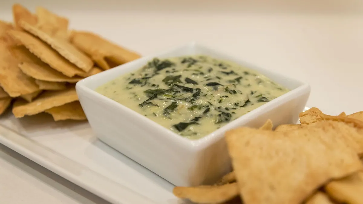 Can Dogs Eat Spinach Artichoke Dip? Dairy and Onion Risks