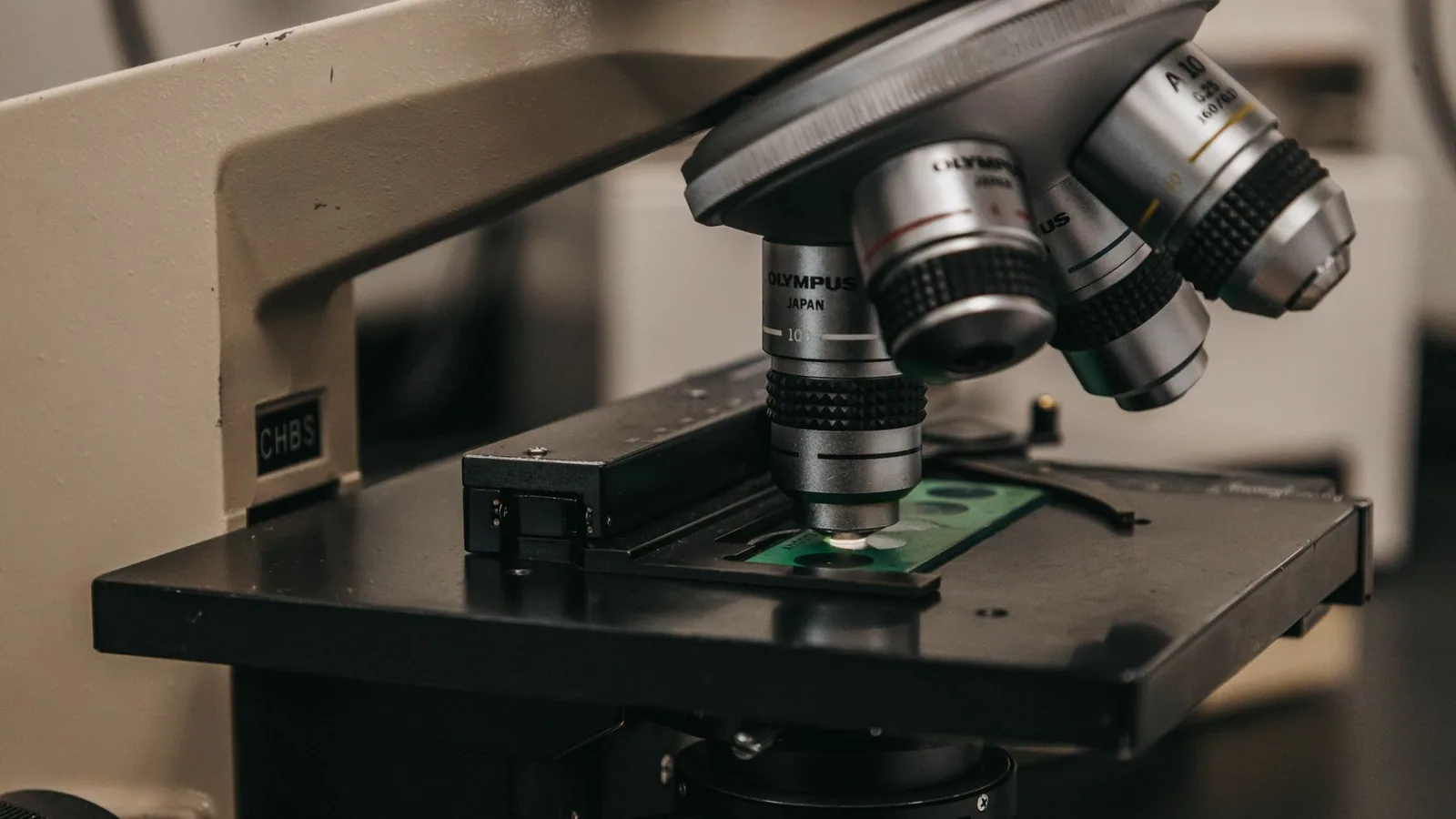 Detailed view of a laboratory microscope, essential for scientific research and analysis